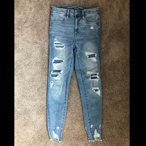 Light wash distressed/patched jegging